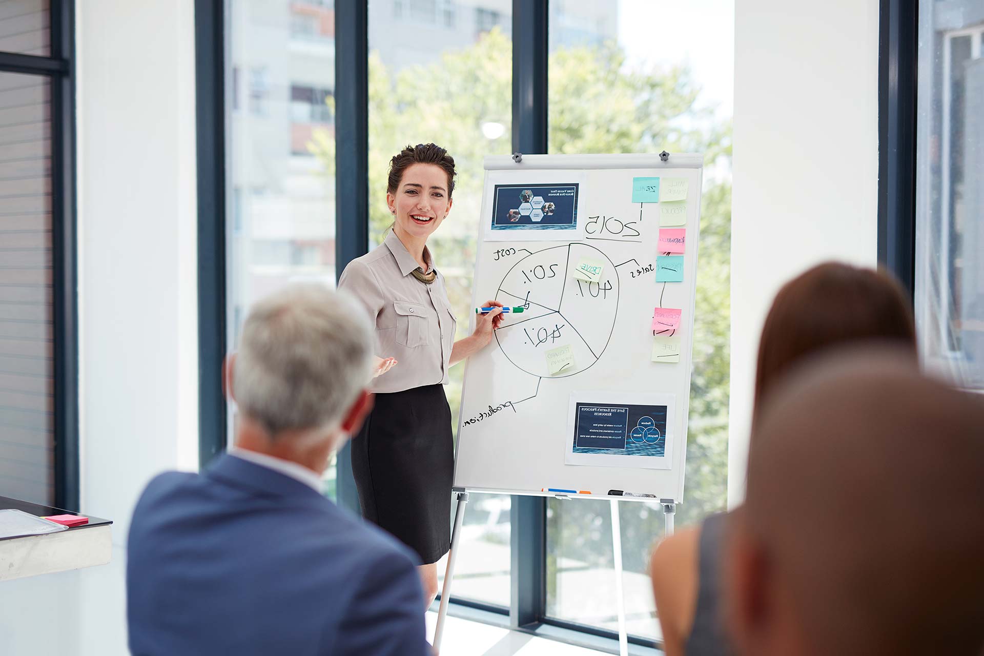 IT specialist presenting a small business IT plan to clients in Massachusetts
