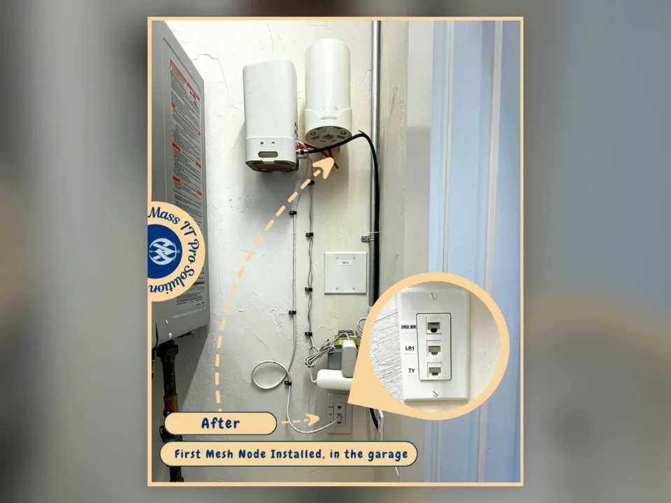 Installed mesh Wi‑Fi node in the garage area with labeled CAT6 wall ports during a residential network upgrade in Brighton Massachusetts.