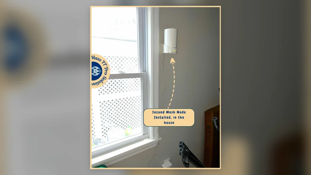 Second TP-Link Deco mesh Wi‑Fi node mounted inside the home to improve whole-home wireless coverage in Brighton Massachusetts.