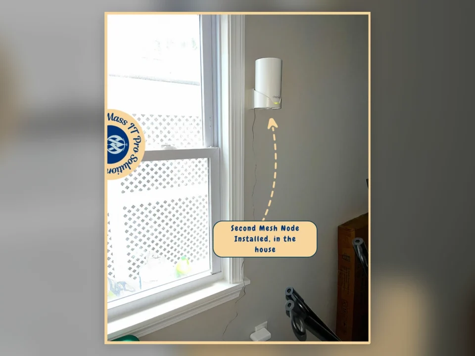 Second TP-Link Deco mesh Wi‑Fi node mounted inside the home to improve whole-home wireless coverage in Brighton Massachusetts.